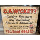 Wooden sign "C A Wickett, Builder & Decorator, Bri