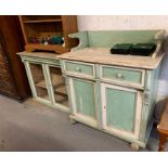 Distressed painted cupboard with glazed doors