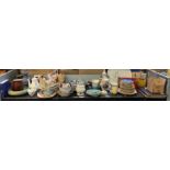 Shelf of plates, jugs, Denby Stoneware plate, box