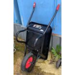 A black metal Chillington wheelbarrow