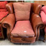 Vintage leather armchair with brass stud