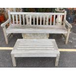 Large wooden garden bench with low table