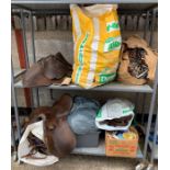 2 shelves of horse gear including leather saddles