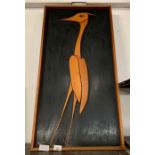 Framed wooden carving of a Heron
