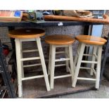 3 wooden stools