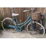 Ladies Raleigh Colette bicycle with basket & mudgu