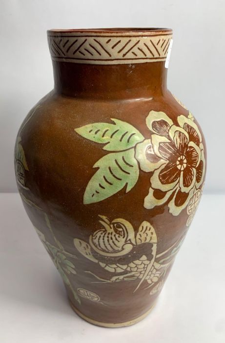 A 19th century E B Fishley vase, decorated with bi