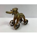 A 20th century brass figure of an elephant on four