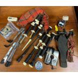A modern set of bagpipes, along with a foot pedal