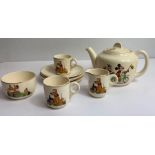 A Beswick Disney porcelain dolls tea service, comp