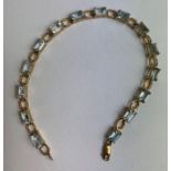A 9 carat gold Gem TV stone set bracelet, 7.4 g gr