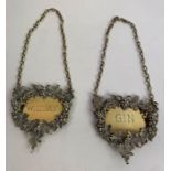 A pair of silver wine labels, by J Figg & Son Ltd,