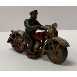 An early 20th century die cast steel painted figur