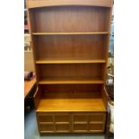 A Nathan teak display unit, with three bookshelves