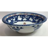 An 18th century Chinese export basin, on a blue grou