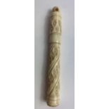 A 19th century bone needle case with carved decora