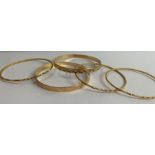 A pair of bangles, of flat section with diamond cu