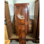 A Victorian mahogany two door wardrobe, standing o
