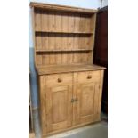 A Victorian pine dresser, with two section plate r