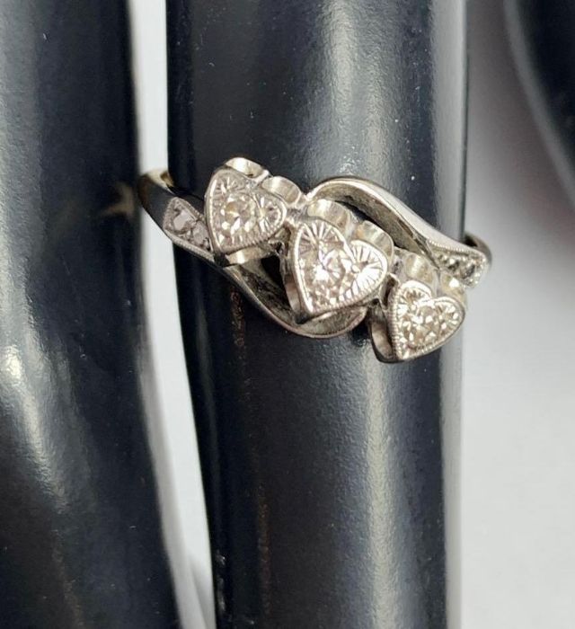 A three stone diamond ring, stamped ‘18ct and PLAT - Image 2 of 5