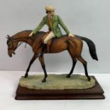 A Border Fine Arts figure of a gentleman on his ba