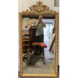 A 20th century gilt framed mirror, with painted hi