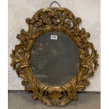 A 19th century gilt carved wooden framed ornate mi