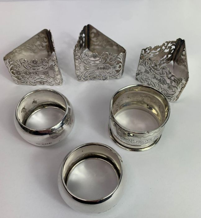 A trio of pierced silver napkin rings, by Jackson