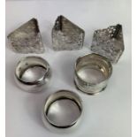 A trio of pierced silver napkin rings, by Jackson
