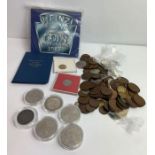 A small collection of cased commemorative coins, t