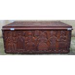 A 20th century hardwood blanket box, carved with v