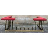 A 20th century brass and red velvet upholstered cl