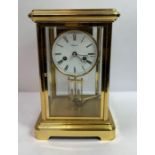 A late 20th century 4 glass brass cased mantle clock