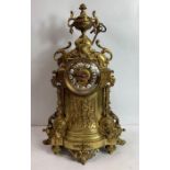 Late 19th century French brass mantle clock with R