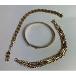 A 9 carat gold four bar gate link bracelet; a 9 ca