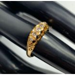 An 18 carat gold Edwardian five stone diamond ring