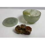 A Chinese jade bowl, 7cm diameter; along with a ja
