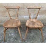 A pair of Ercol 440 elm and beech stacking chairs