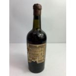 A bottle of vintage Constantino's 1945 port with a