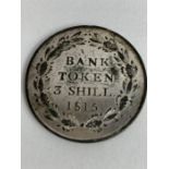 A George III 1815 three shilling bank token