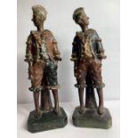 A pair of 19th century terracotta figures of males,