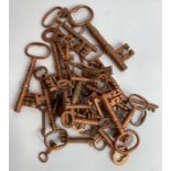 A collection of coppered keys, of various sizes an