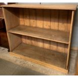 A Victorian pine open bookcase, with single shelf,