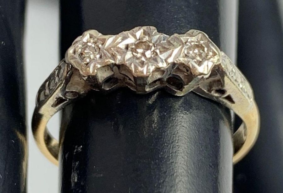 A three stone diamond ring, stamped ‘18ct and PLAT - Image 4 of 5