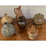 A small collection of studio pottery, along with a