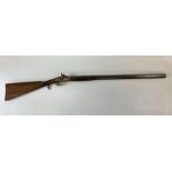 A 19th century pin fire single barrel shotgun, unm