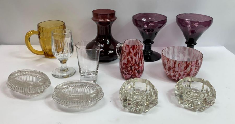 A pair of amethyst glass goblets together with var