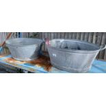 2 galvanized bath tubs