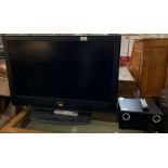 Large Sony television and an Acoustic Solutions Su