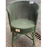 Miniature green painted wicker chair
